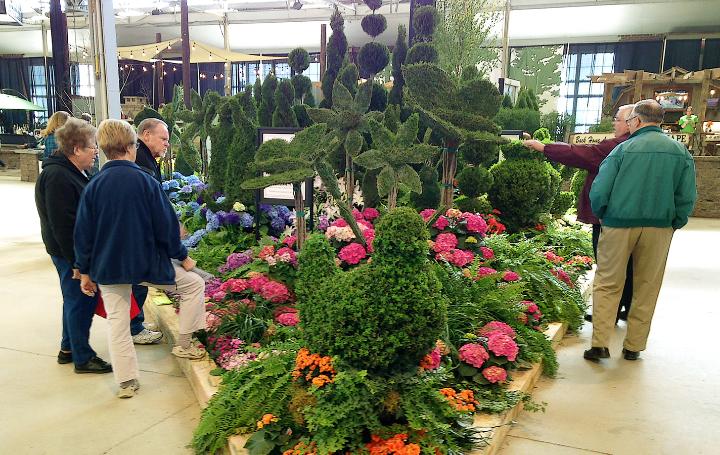 Sculptured hedge and flower display