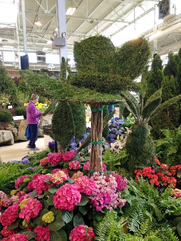 sculptured shrub and flower display