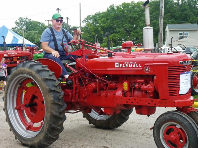 Vintage Red McCormick Farmall Tractor in Sunday's Parade at the Fair