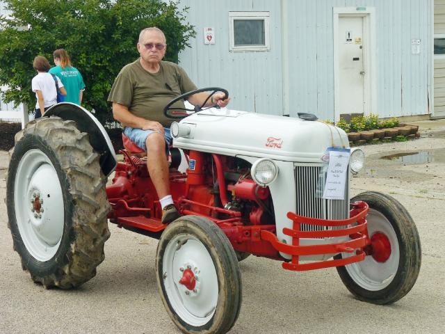 Vintage Red and Gray Ford Tractor in Sunday's Parade at the fair