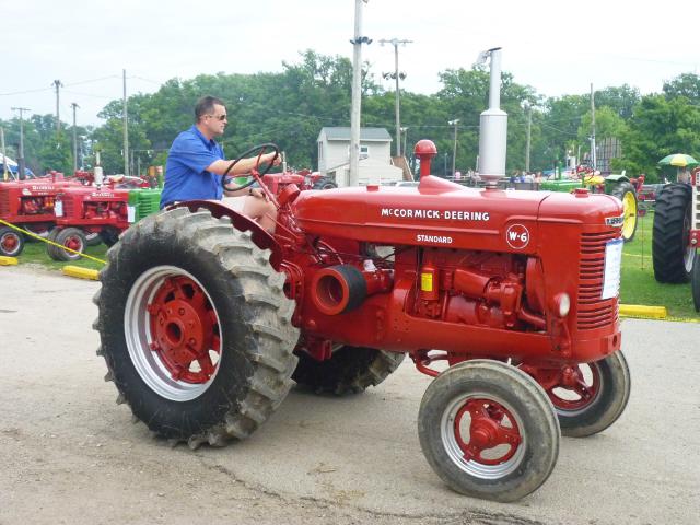 Red McCormick-Deering Standard Tractor in Monday's parade at the fair