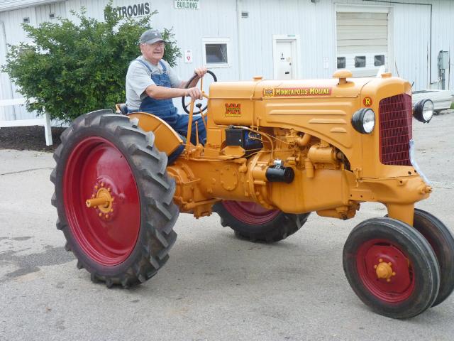 Orange and Red Minneapolis Moline Tractor in Monday's parade at the fair