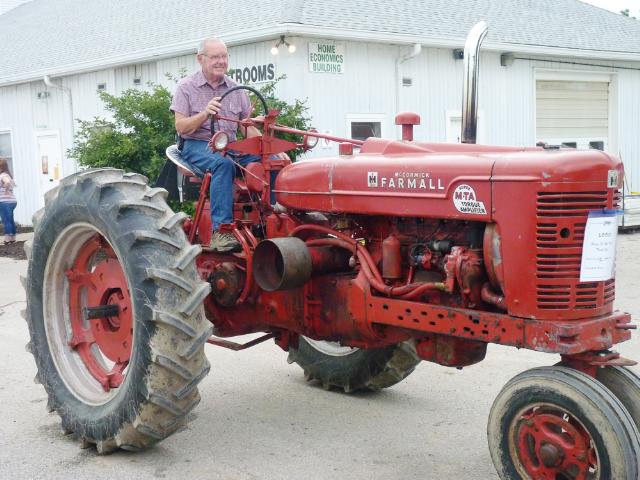 Vintage McCormick Farmall Tractor with Super M-TA Torque Amplifier in Monday's parade at the fair