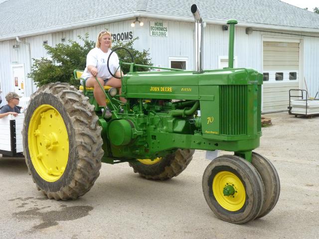 John Deere Diesel Power-Steering Tractor pulling wagon at Monday's parade at the fair