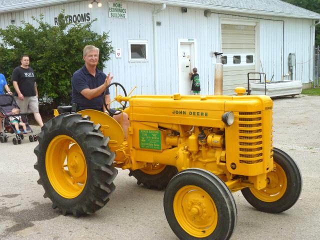 1951 Yellow John Deere "MI" Tractor in Monday's parade at the fair