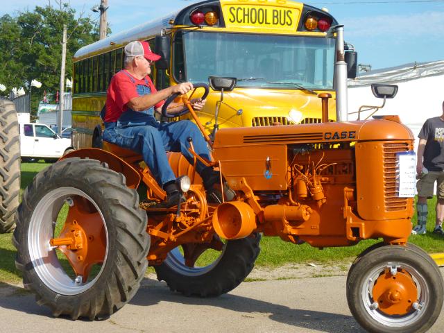 Vintage Orange Case Tractor in Wednesday's parade at the fair